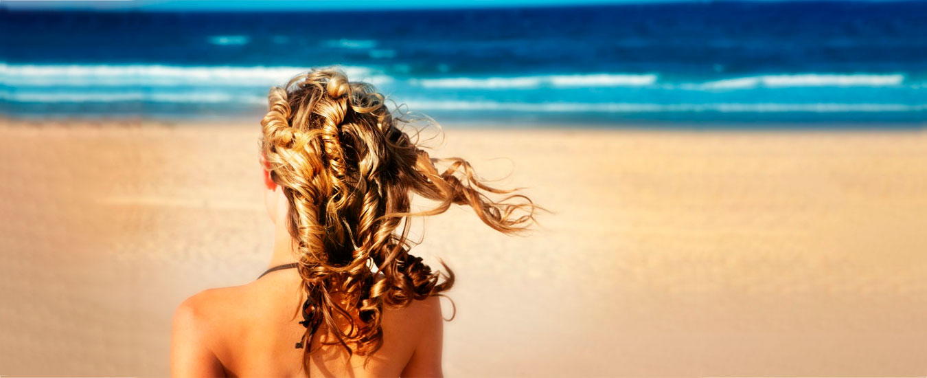 Verão x Cabelo: como proteger os cabelos dos danos da água do mar, sol e piscina